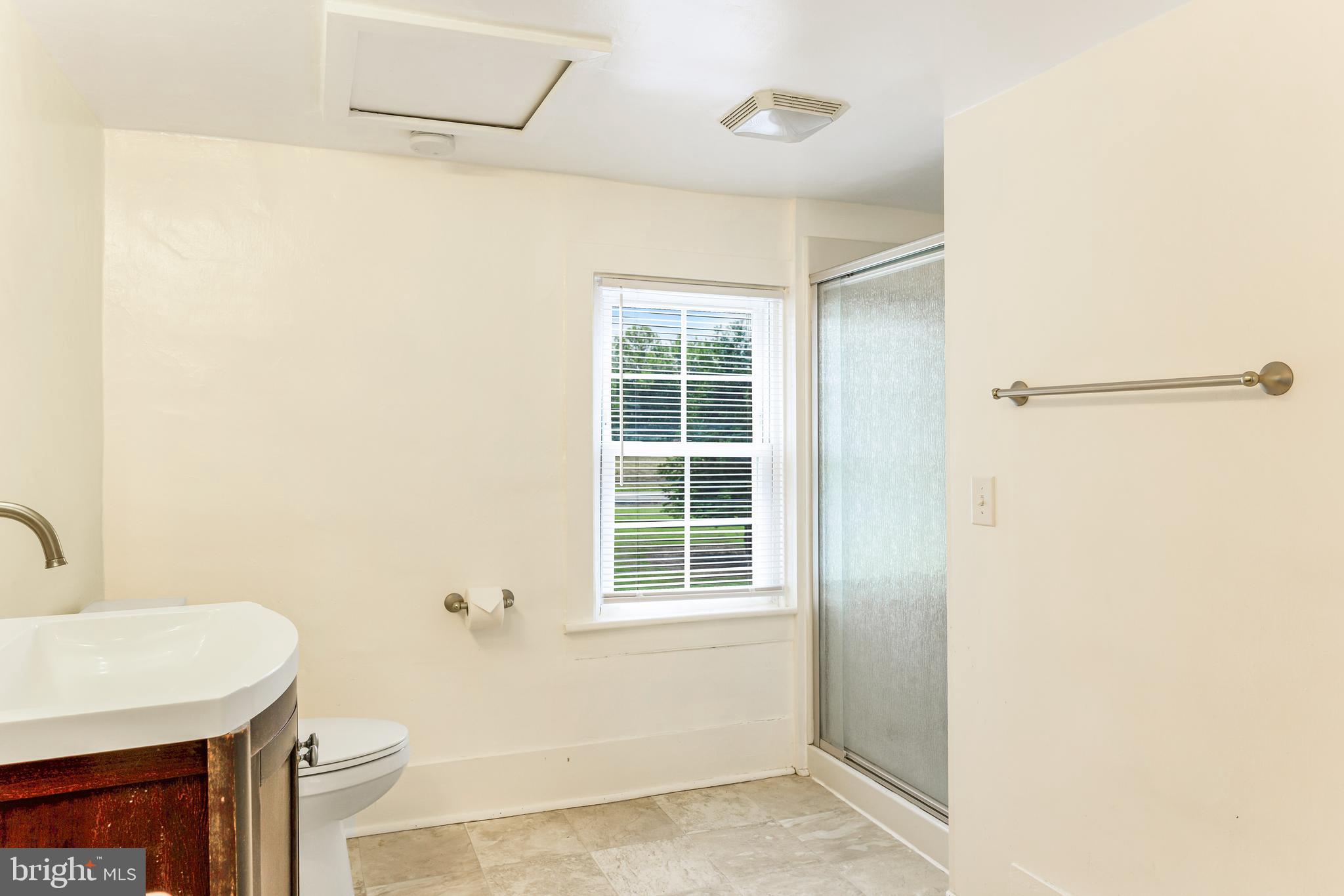 10287 Dahlgren Road King George, VA 22485 - Photo 30 of 54 a bathroom with a sink and a mirror