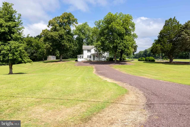 a view of an outdoor space and tennis court