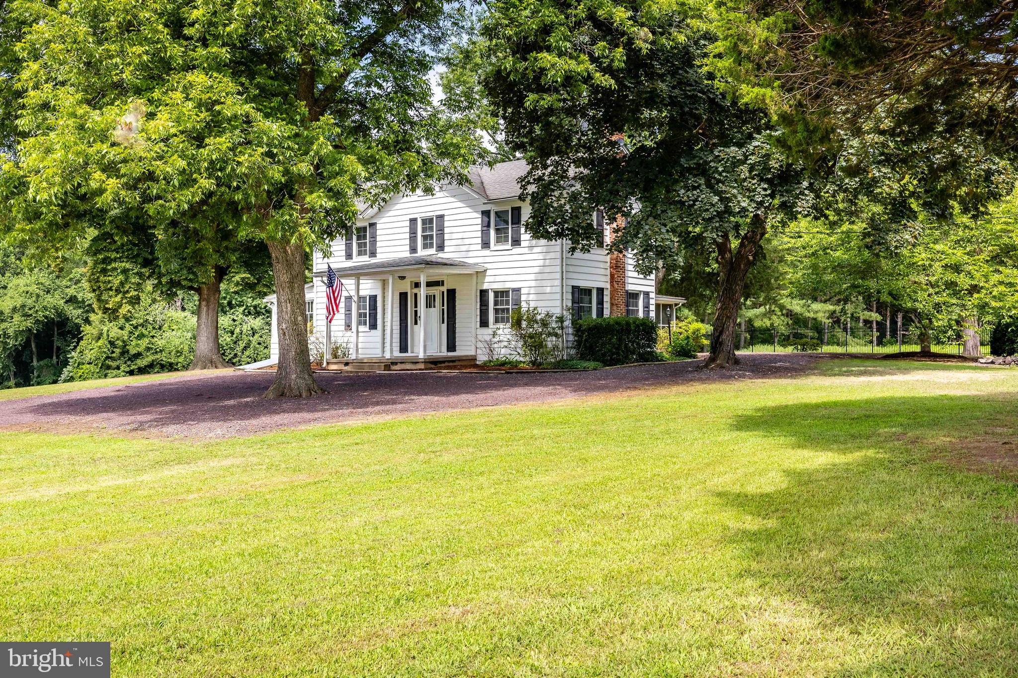 10287 Dahlgren Road King George, VA 22485 - Photo 42 of 54 a front view of a house with a yard