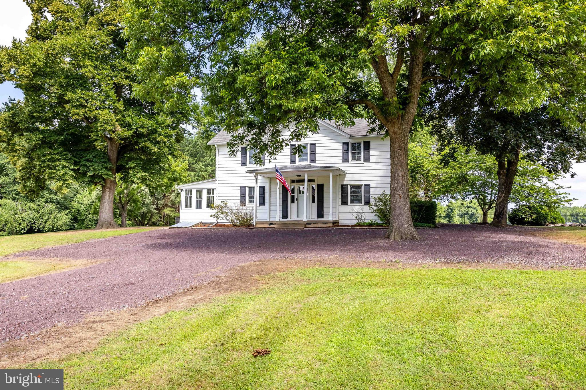 10287 Dahlgren Road King George, VA 22485 - Photo 43 of 54 a view of a house with backyard and a tree