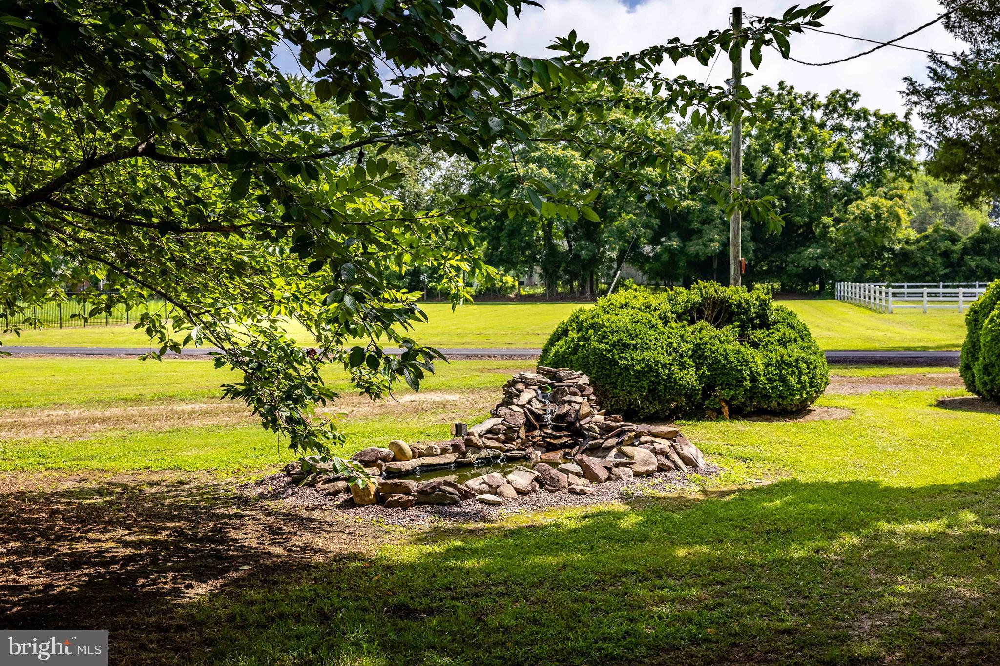 10287 Dahlgren Road King George, VA 22485 - Photo 45 of 54 a view of a lake with a big yard