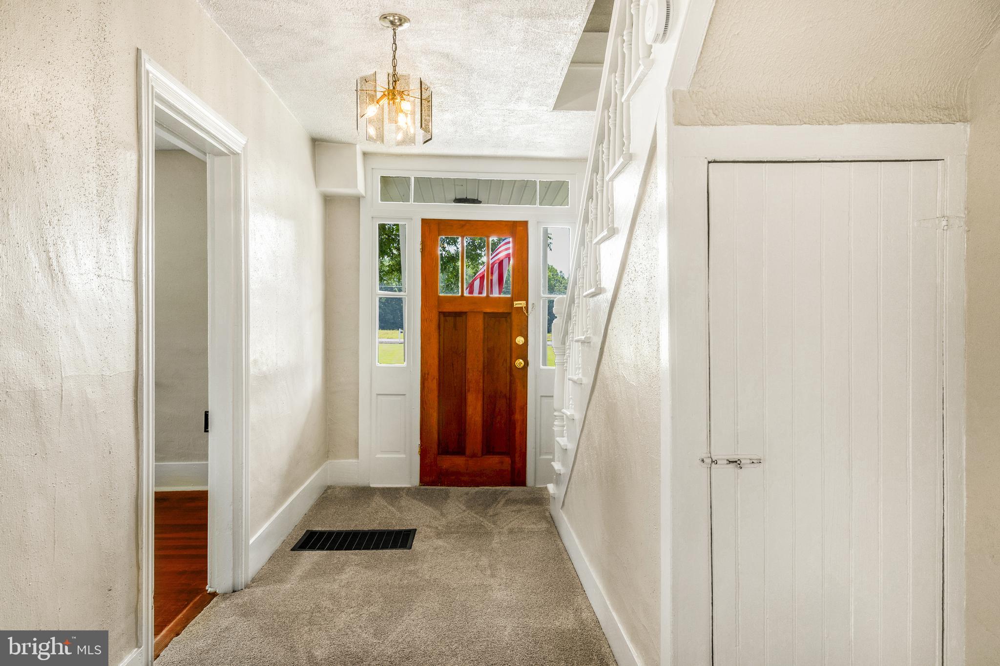 10287 Dahlgren Road King George, VA 22485 - Photo 5 of 54 a view of a hallway to rooms