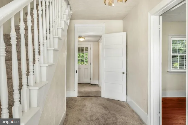 a view of a bathroom with a glass door
