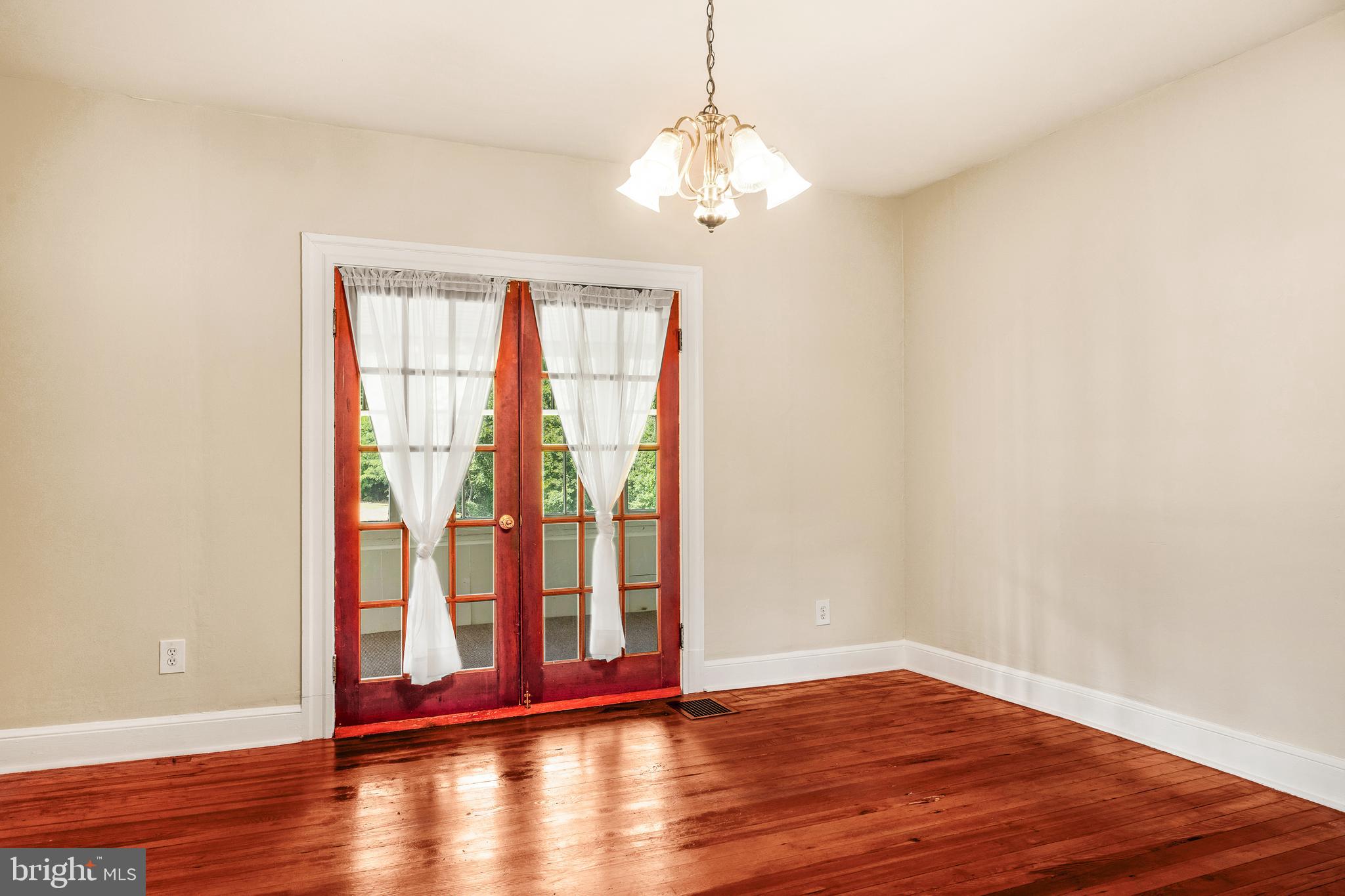 10287 Dahlgren Road King George, VA 22485 - Photo 10 of 54 a view of a room with wooden floor