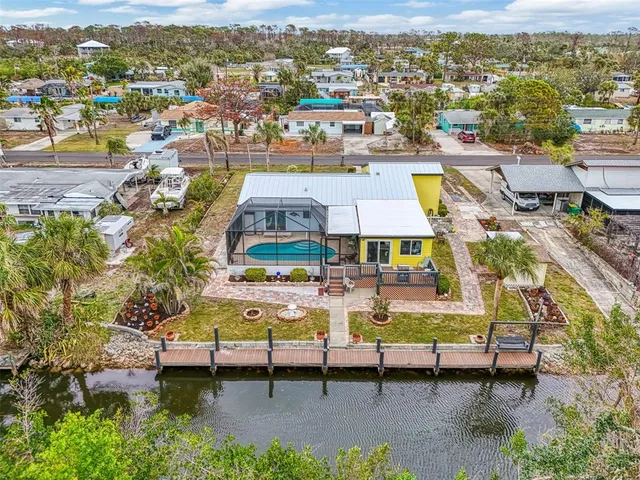 a view of a lake with a house