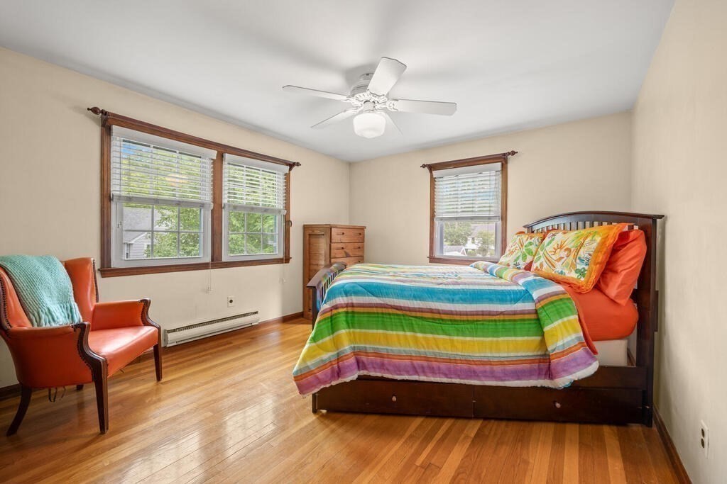 155 Main Street Winchester, MA 01890 - Photo 17 of 35 a bedroom with a bed and a window