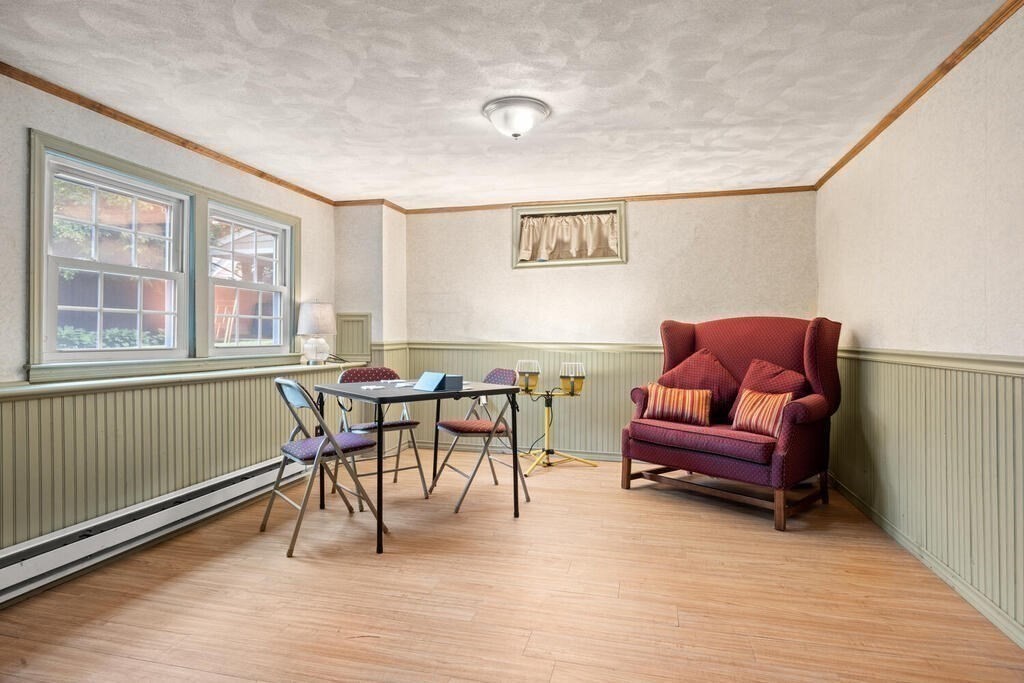 155 Main Street Winchester, MA 01890 - Photo 25 of 35 a living room with furniture and a window