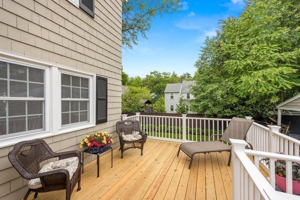 155 Main Street Winchester, MA 01890 - Photo 26 of 35 a view of a two chairs in the deck