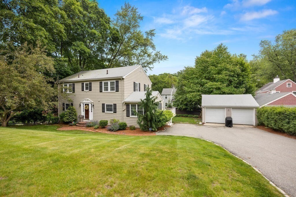155 Main Street Winchester, MA 01890 - Photo 31 of 35 front view of a house with a yard