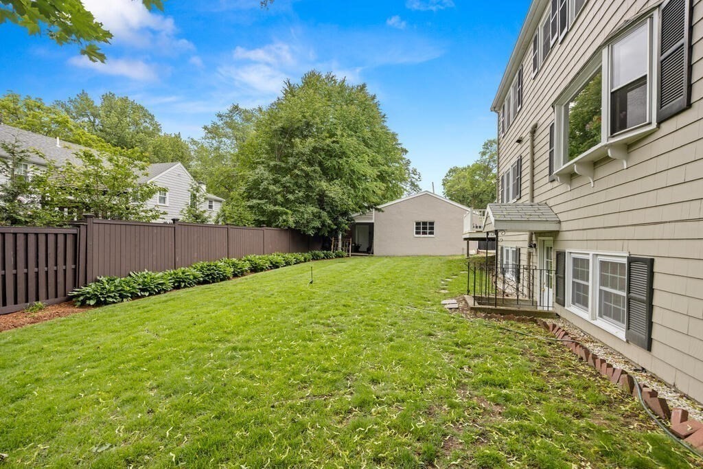 155 Main Street Winchester, MA 01890 - Photo 34 of 35 a view of a house with a yard