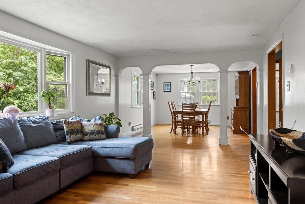 155 Main Street Winchester, MA 01890 - Photo 4 of 35 a living room with furniture and a large window