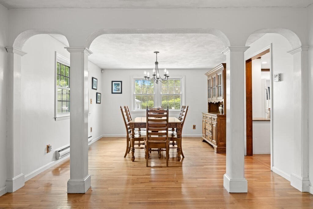155 Main Street Winchester, MA 01890 - Photo 7 of 35 a view of a dining room with furniture and window