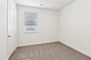 2448 Glacier Ridge Corinth, TX 76210 - Photo 19 of 27 an empty room with a window
