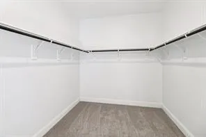 an empty room with a bathroom