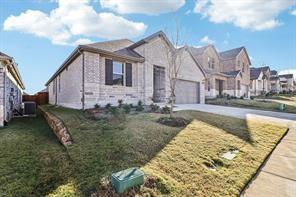 2448 Glacier Ridge Corinth, TX 76210 - Photo 2 of 27 a view of a big house with a big yard and large tree