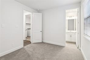 2448 Glacier Ridge Corinth, TX 76210 - Photo 21 of 27 an empty room with a bathroom