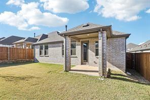 2448 Glacier Ridge Corinth, TX 76210 - Photo 24 of 27 a front view of a house with a yard