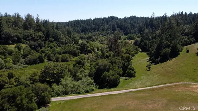 a view of a lake with a mountain in the background