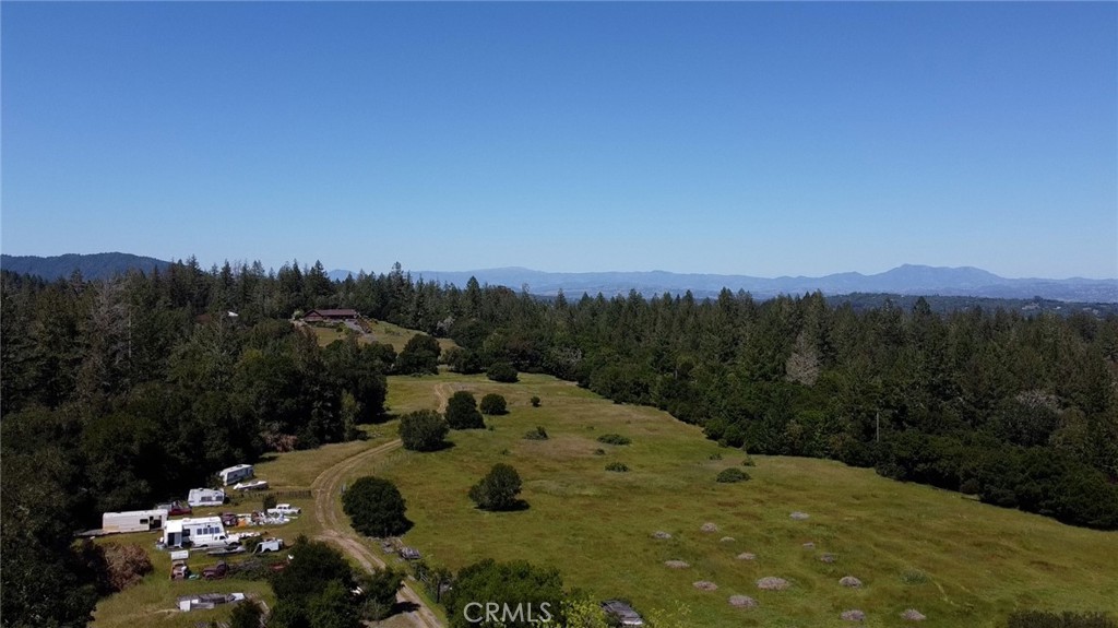 12760 Green Valley Road Sebastopol, CA 95472 - Photo 8 of 35 a view of a lake with a mountain in the background