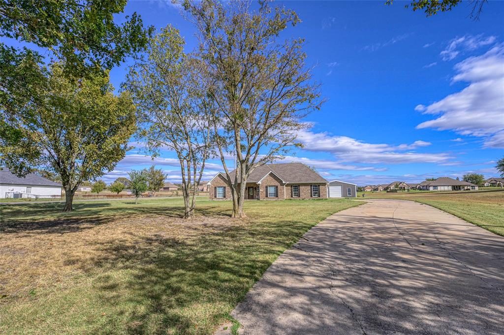 10264 Farmington Road Van Alstyne, TX 75495 - Photo 4 of 39 a view of an outdoor space with swimming pool