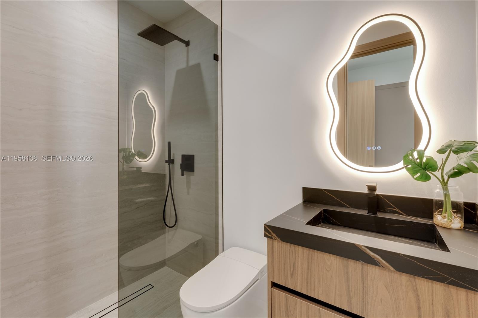 11000 Southwest 120th Street Miami, FL 33176 - Photo 43 of 75 a bathroom with a sink a toilet and shower