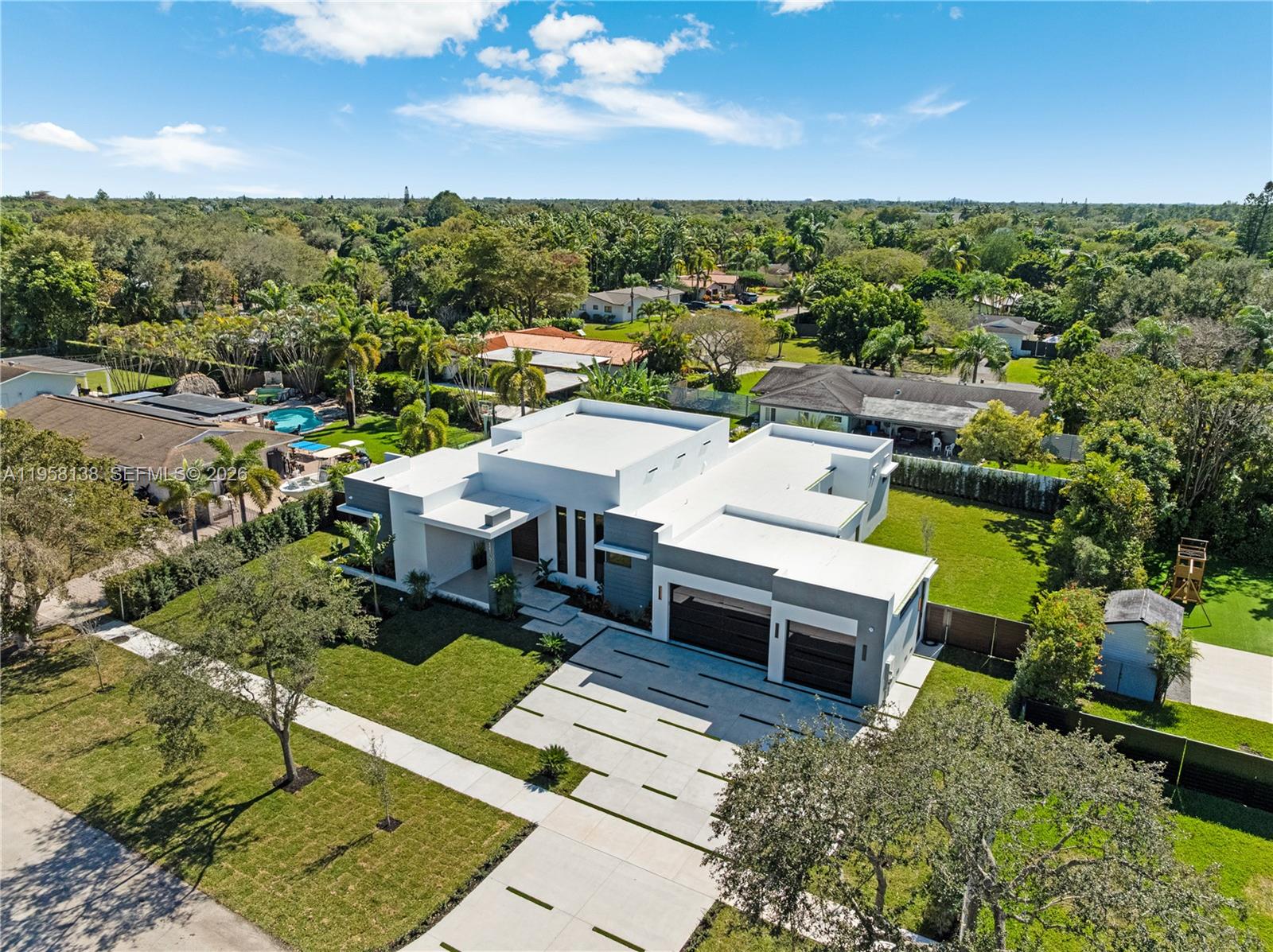 11000 Southwest 120th Street Miami, FL 33176 - Photo 74 of 75 an aerial view of a house with a yard basket ball court and outdoor seating