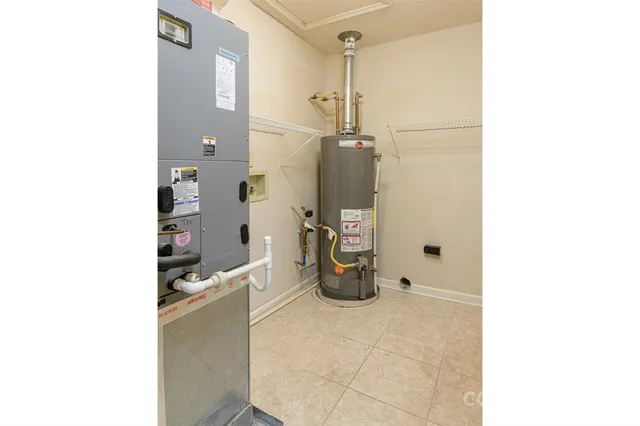 a view of a utility room with closet