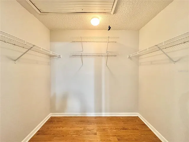 a view of a room with racks on the wall
