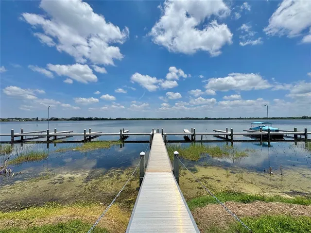 a view of a balcony with wooden floor