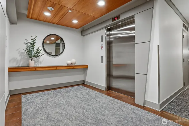 a view of a building with sitting area