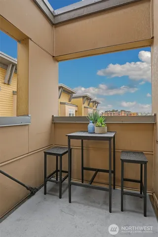 a view of a workspace with furniture