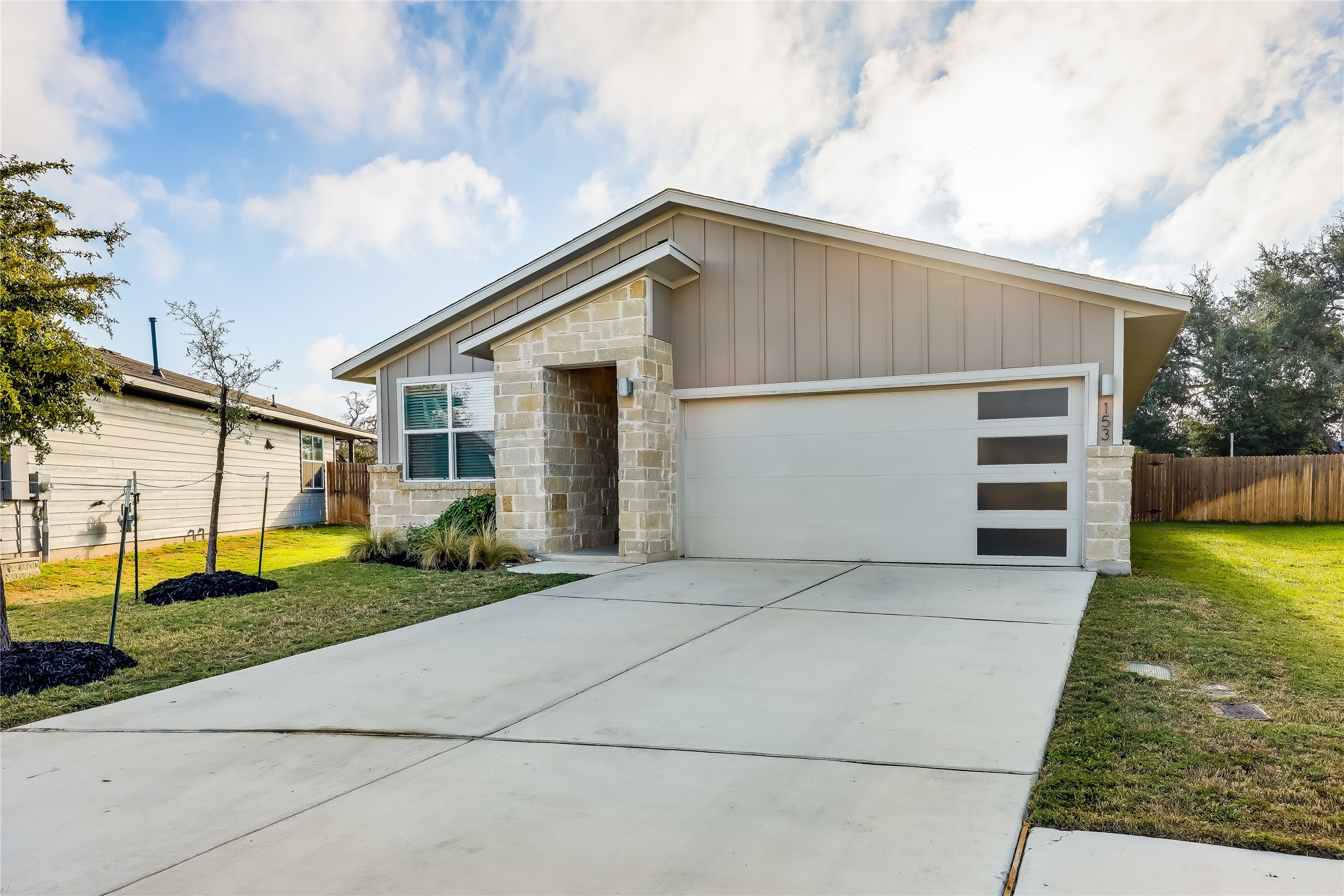 153 Filifera Court Leander, TX 78641 - Photo 2 of 33 a view of a house with a yard