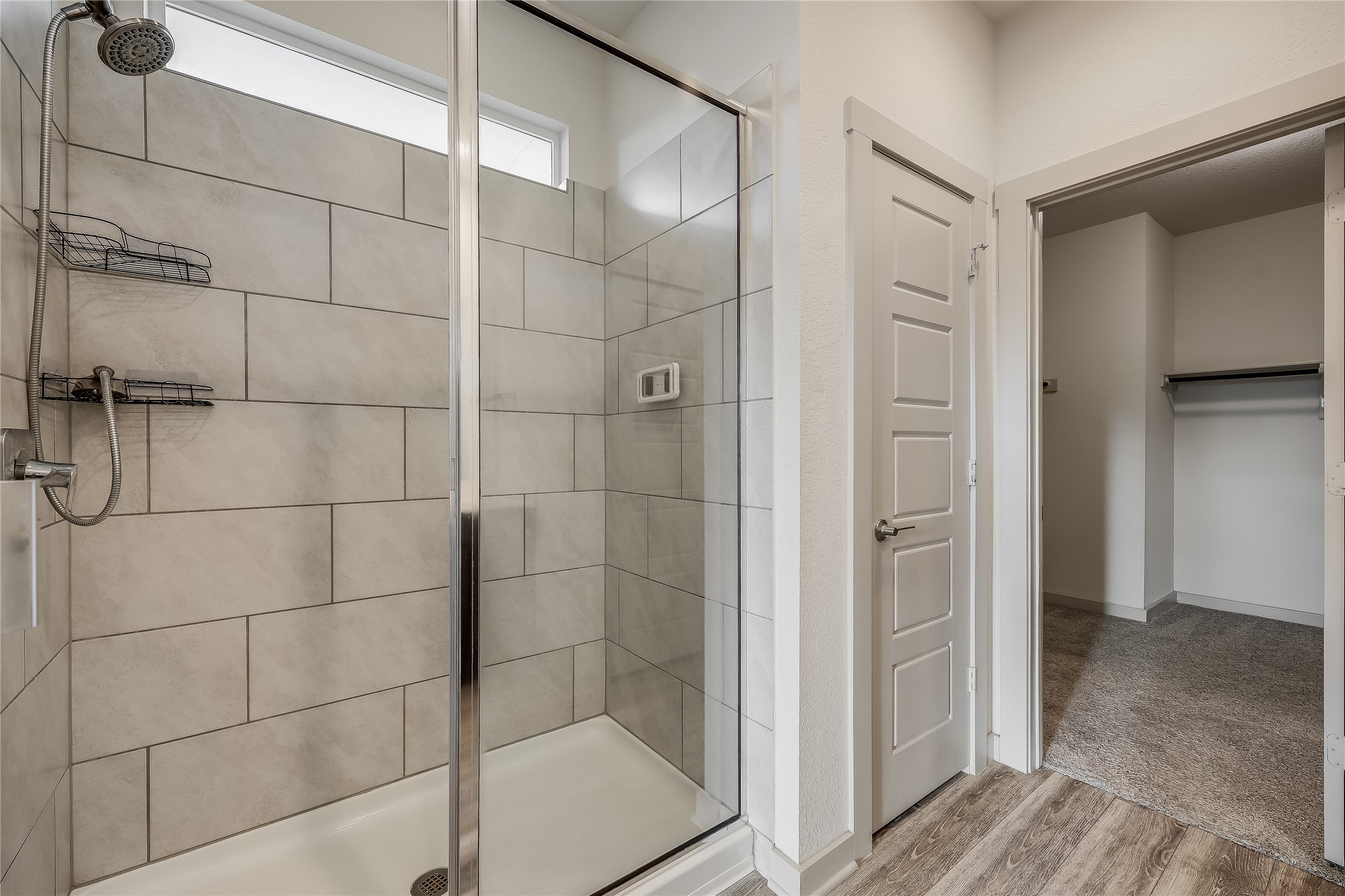 153 Filifera Court Leander, TX 78641 - Photo 24 of 33 a bathroom with a shower
