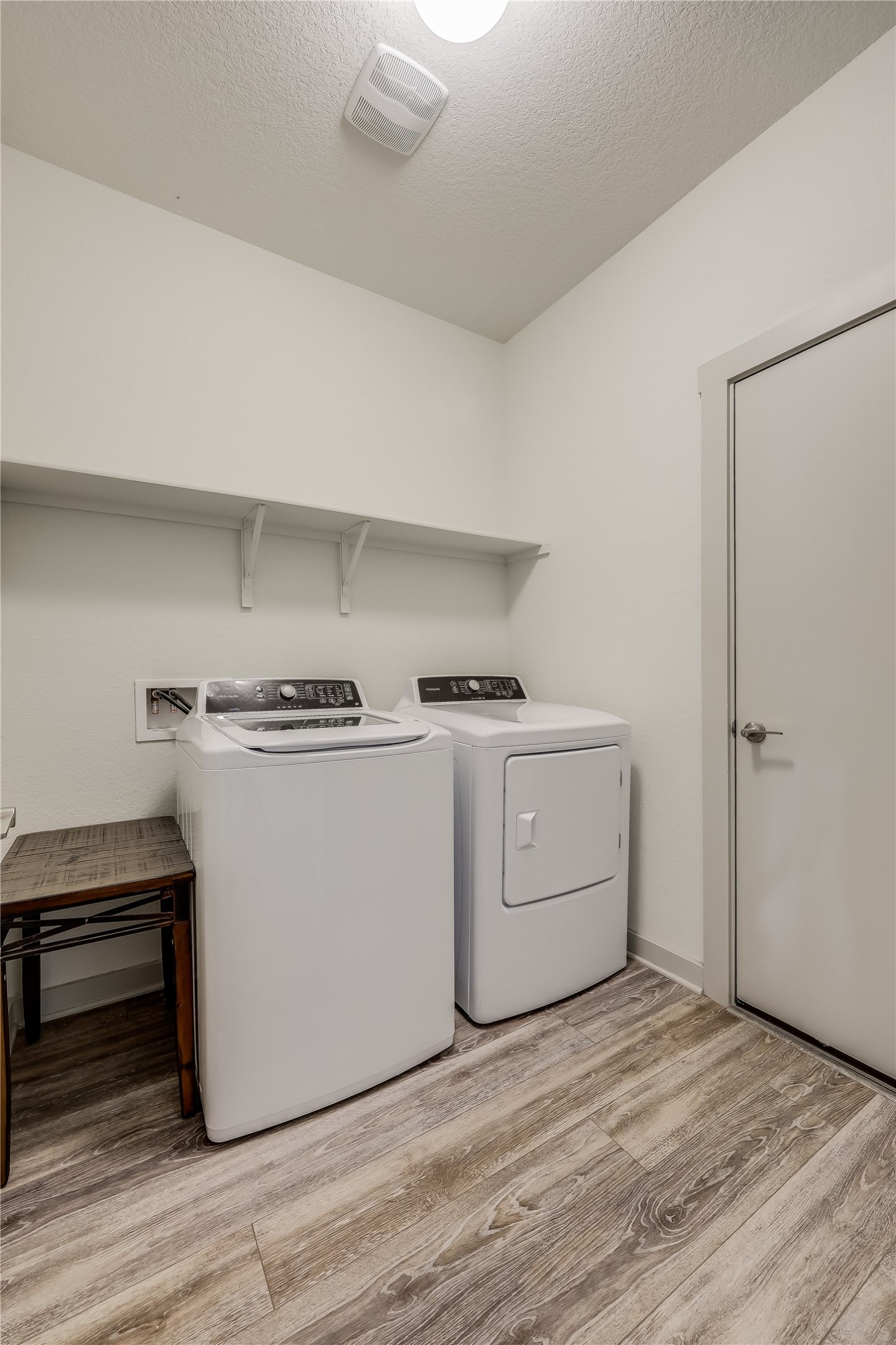 153 Filifera Court Leander, TX 78641 - Photo 29 of 33 a utility room with washer and dryer