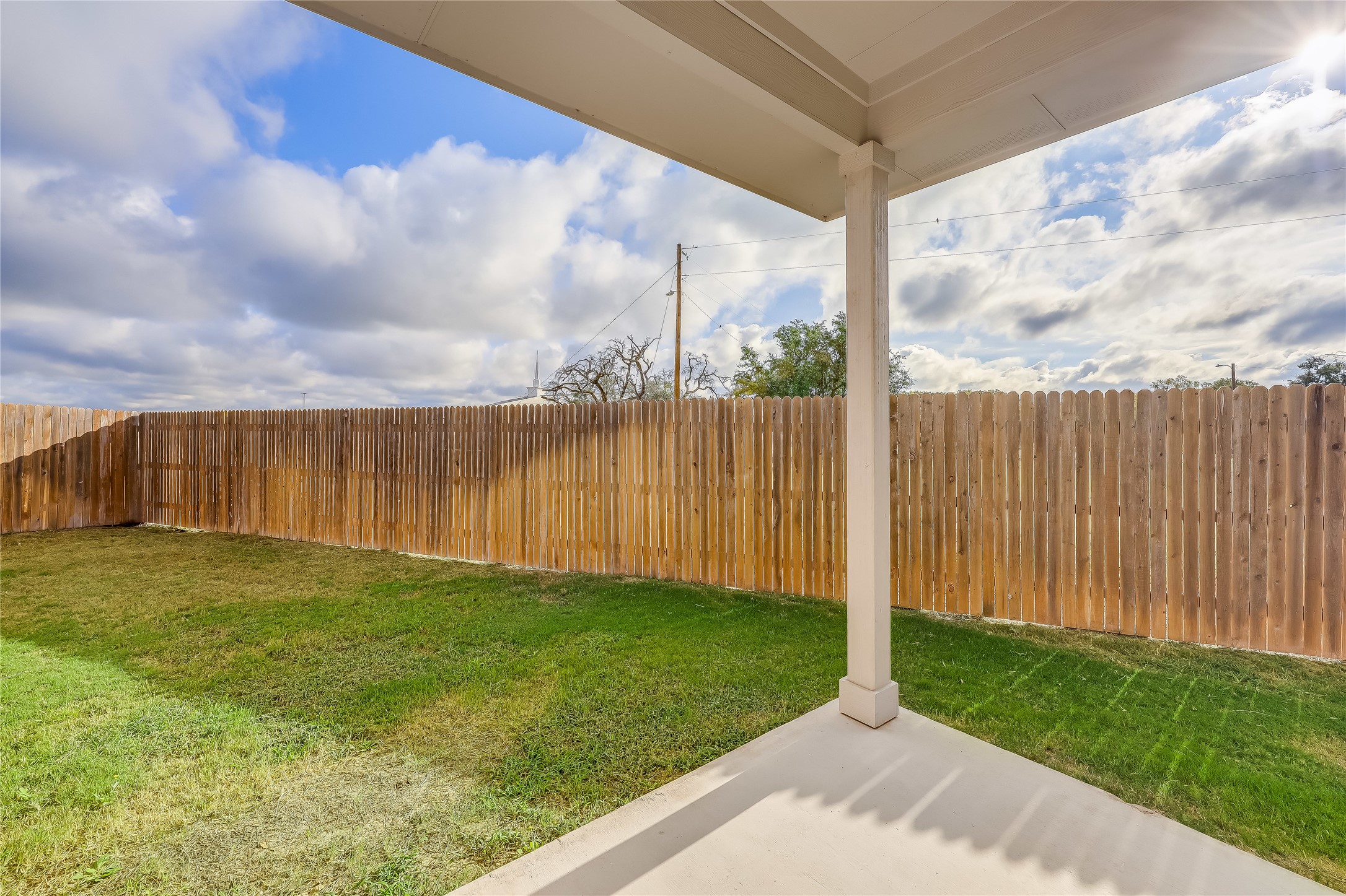 153 Filifera Court Leander, TX 78641 - Photo 30 of 33 a view of a backyard with wooden fence