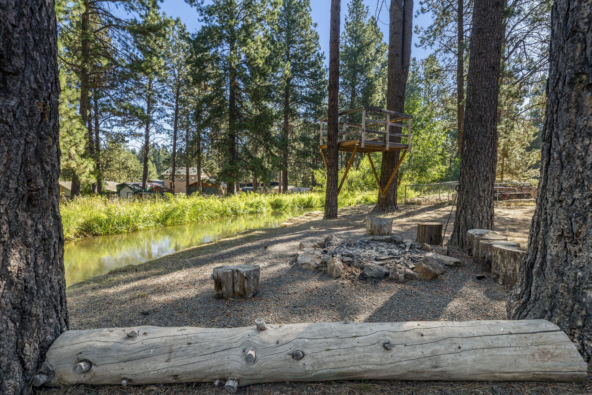 19254 Galen Road Bend, OR 97702 - Photo 8 of 53 Beautiful home on almost 1/2 acre, surrounded by mature Ponderosa Pines. Enjoy indoor / outdoor living with the wrap around deck, garden and landscaped yards.