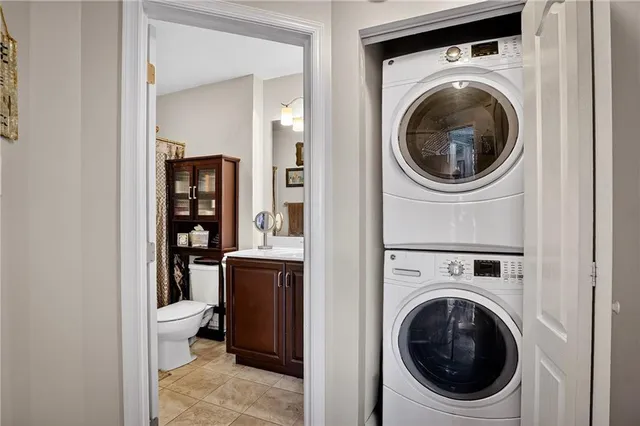 a view of a hallway with washer and dryer