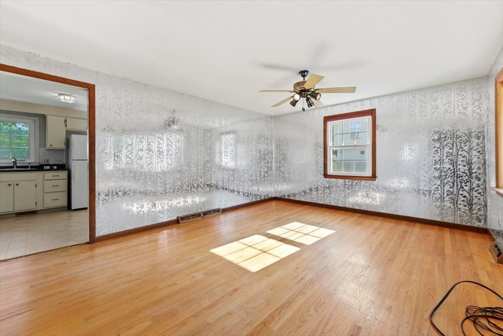 90 Fallston Street Springfield, MA 01119 - Photo 13 of 38 a view of a living room a window and wooden floor