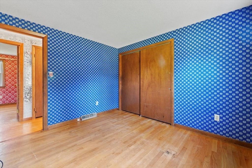 90 Fallston Street Springfield, MA 01119 - Photo 16 of 38 a view of a room with wooden floor