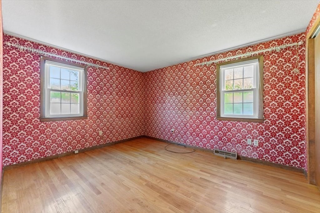 90 Fallston Street Springfield, MA 01119 - Photo 18 of 38 a view of an empty room with a window