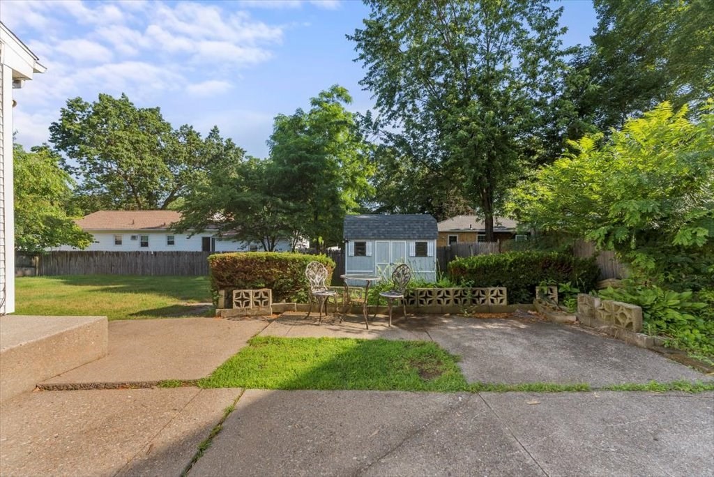 90 Fallston Street Springfield, MA 01119 - Photo 31 of 38 a view of backyard with outdoor seating and green space