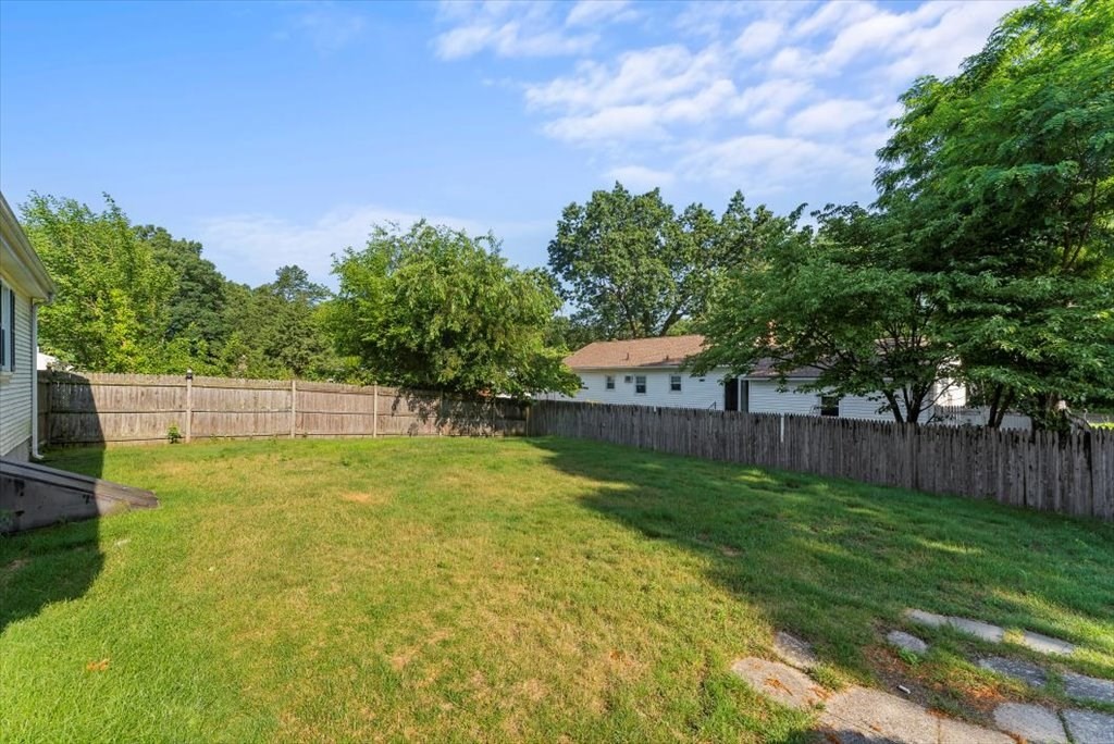 90 Fallston Street Springfield, MA 01119 - Photo 33 of 38 a view of a backyard with a small cabin