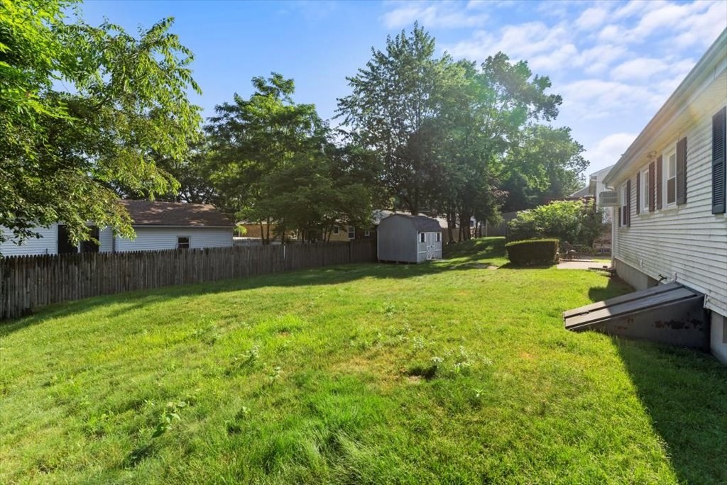90 Fallston Street Springfield, MA 01119 - Photo 38 of 38 a view of a backyard with a garden