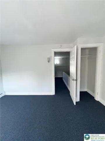 an empty room with closet