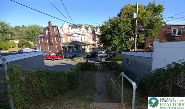 a view of yard with patio
