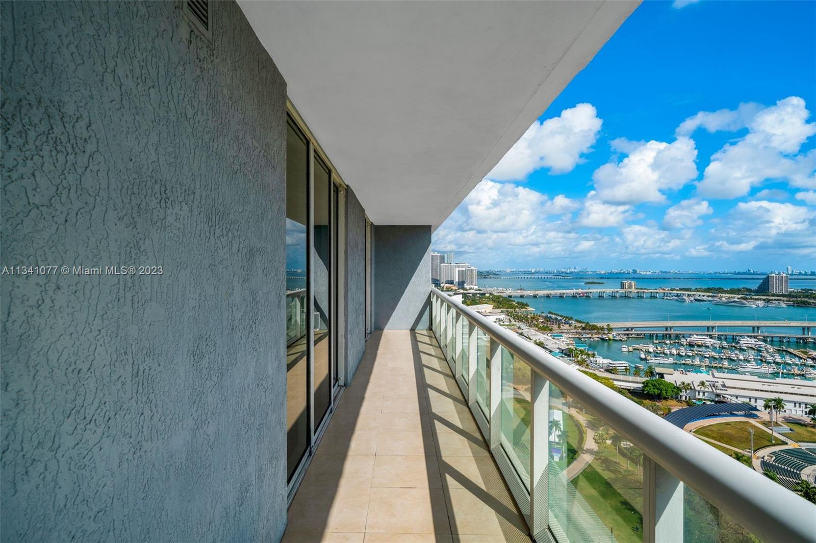 50 Biscayne Boulevard, Unit 3108 Miami, FL 33132 - Photo 13 of 26 a view of a balcony with an ocean view