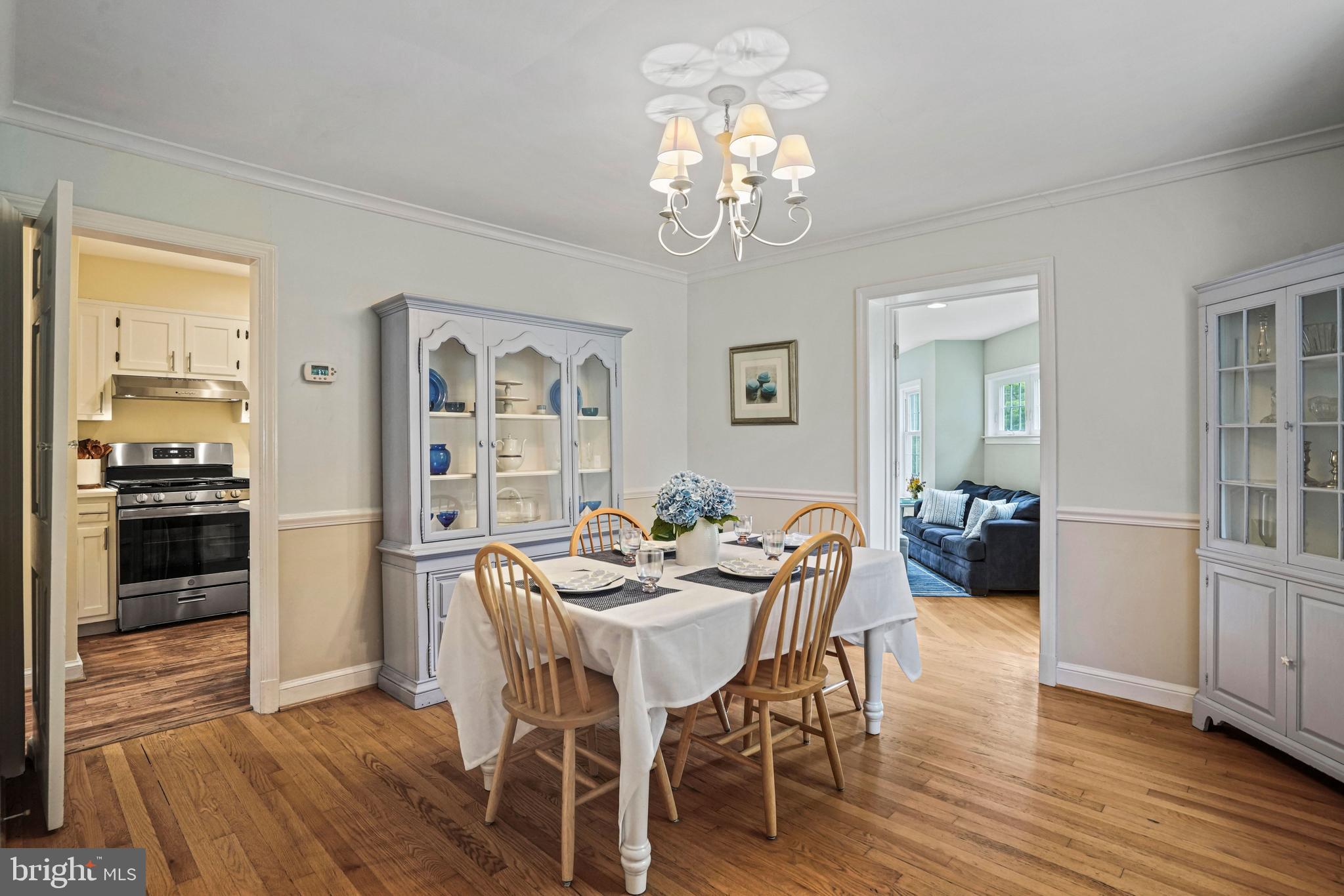 1907 Brisbane Street Silver Spring, MD 20902 - Photo 8 of 39 a view of a dining room with furniture and wooden floor