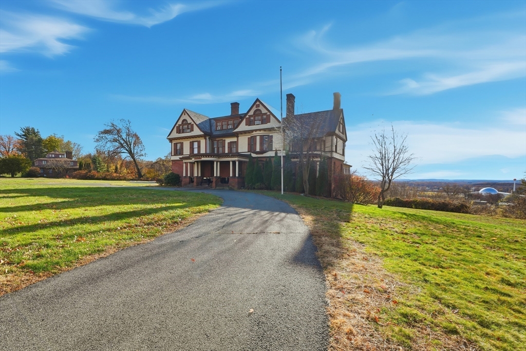 270 Maple Street Springfield, MA 01105 - Photo 40 of 42 a view of a house with a yard
