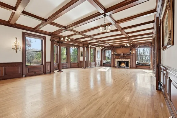 a view of living room with furniture and floor to ceiling windows