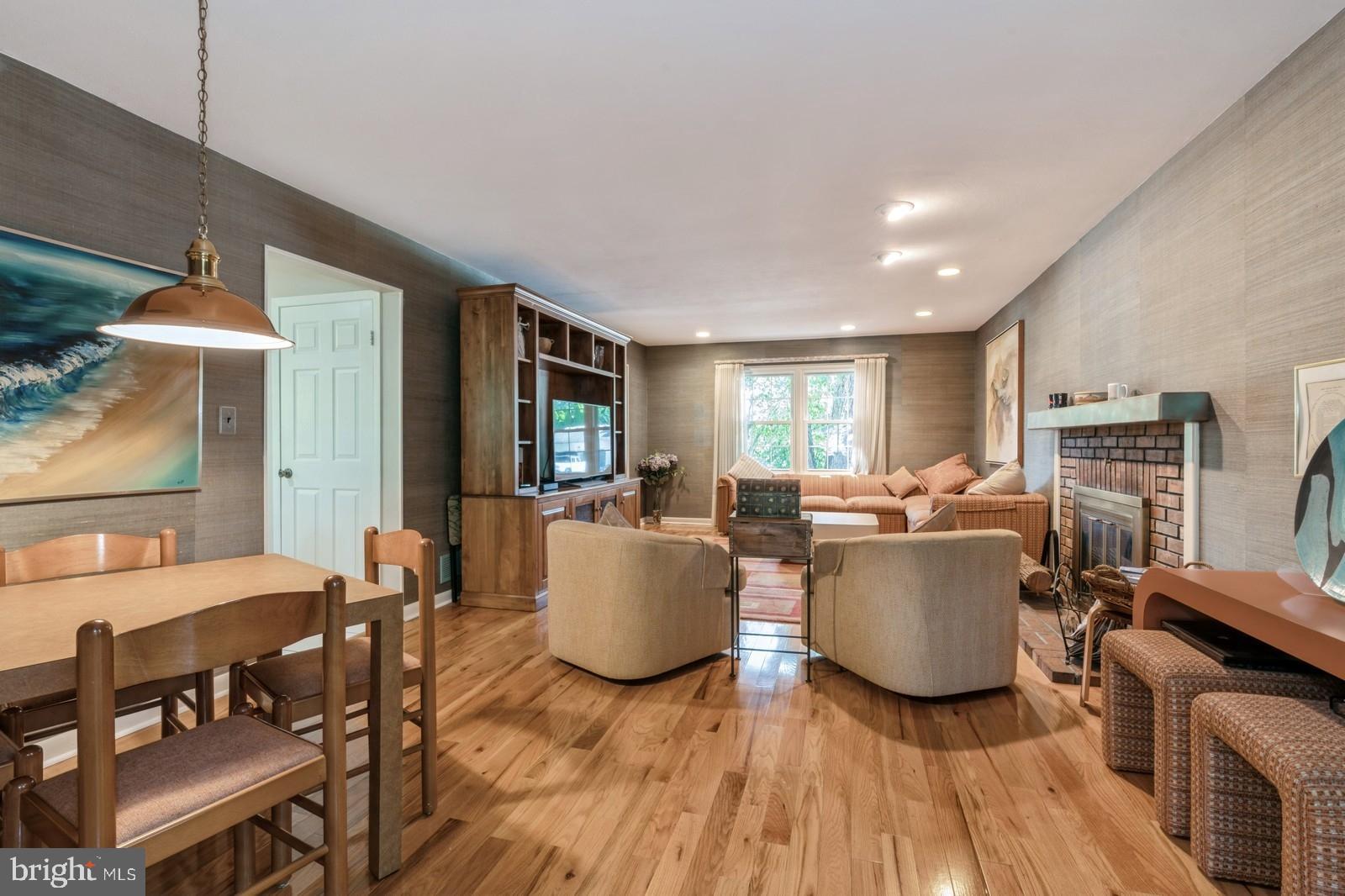 149 Parker Road South Plainsboro, NJ 08536 - Photo 13 of 57 a living room with fireplace furniture and a wooden floor